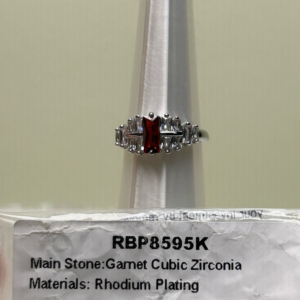 Kids Garnet Cubic Zirconia Ring on Rhodium (silver).  Adjustable size 3-5.